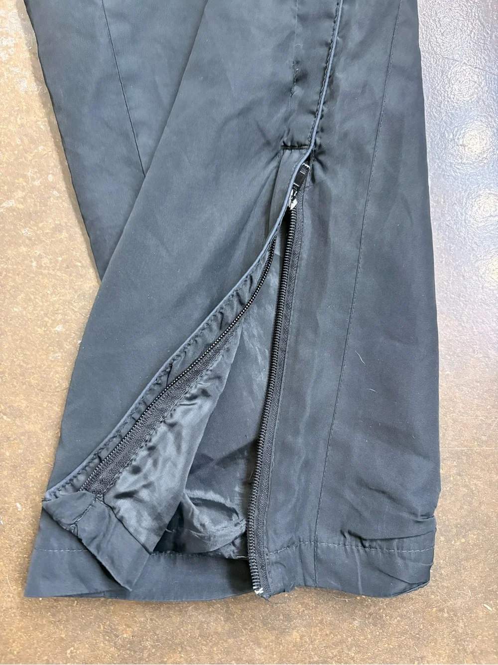 New Balance Men’s Black Track Pants with Zipper Hems